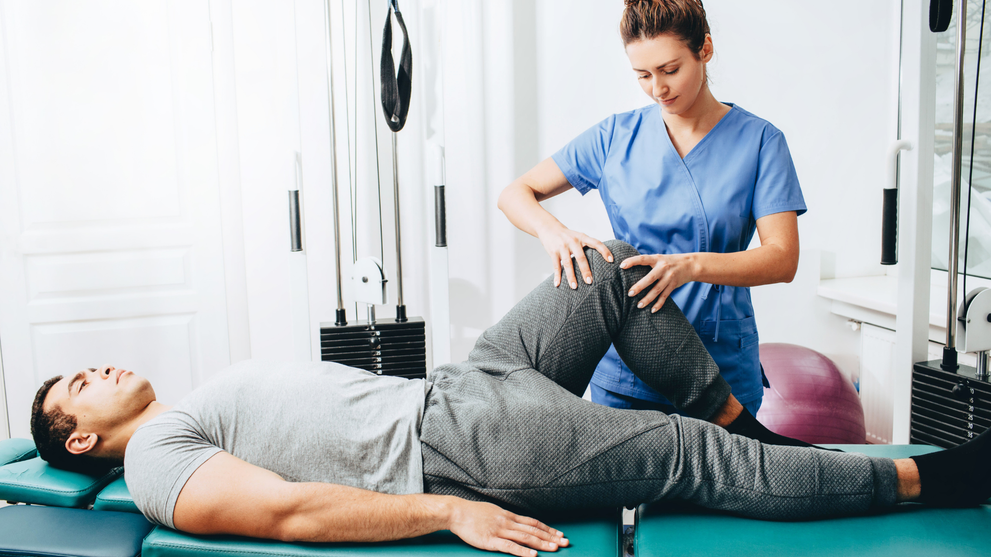 Ice Pack Applied To Knee After Surgery